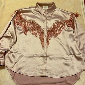 A rose gold shirt with sparkling strings  size Large